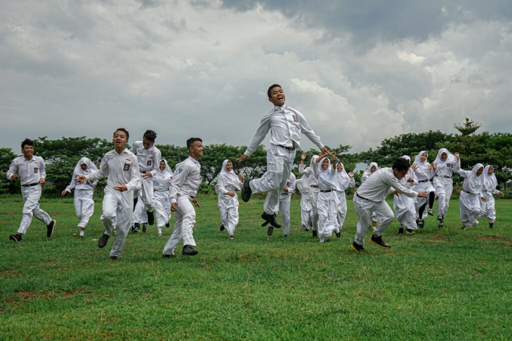 3zquh7milxg - Why Running a Martial Arts School IS a Picnic! group of people in white uniform on green grass field during daytime