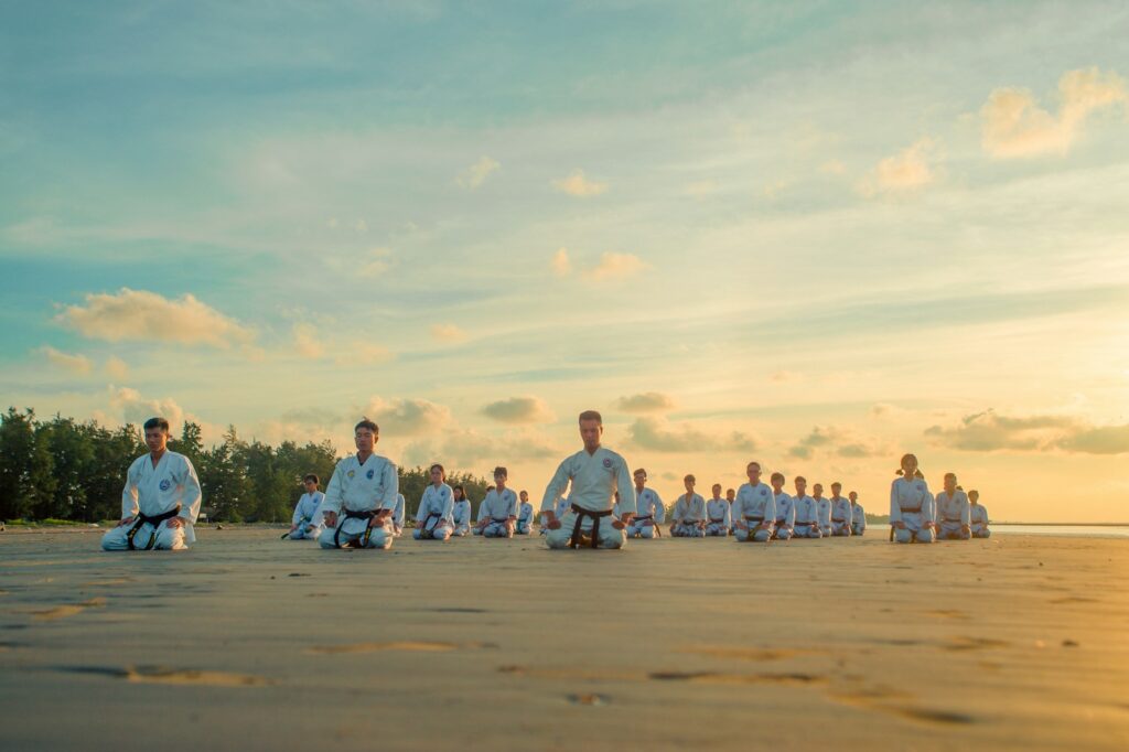 dz7idvxr6ac - Create an experience for your customers like no other... people kneeling on field during daytime