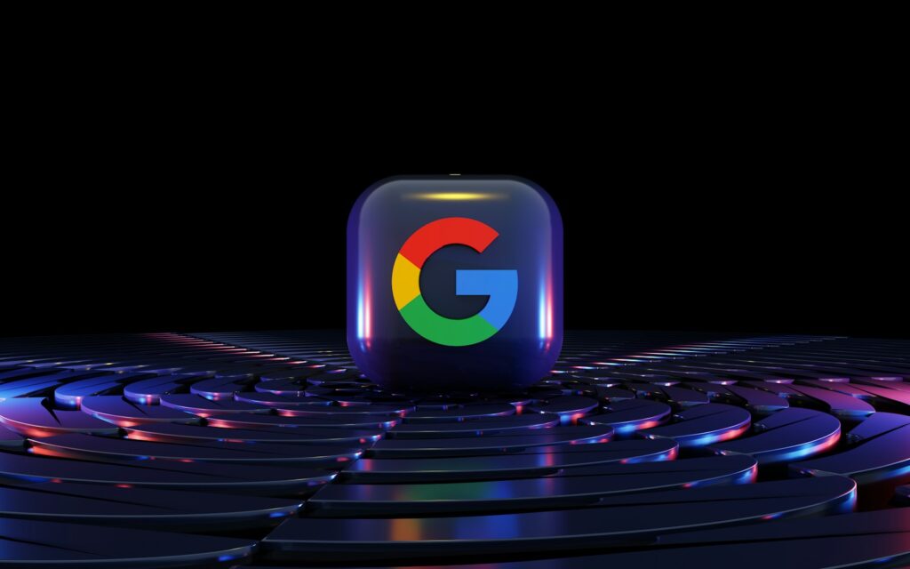 a google logo sitting on top of a computer keyboard